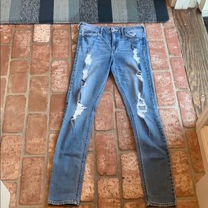 High rise ripped Hollister skinny jeans.